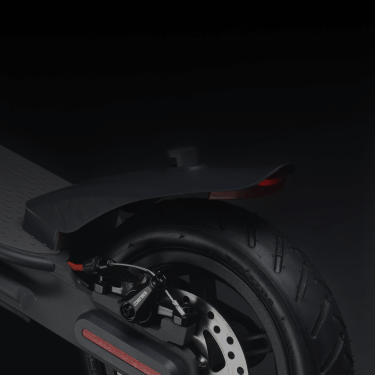 Background image of a Ducati scooter